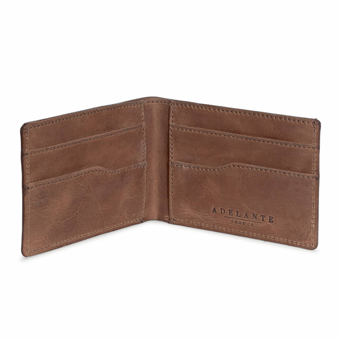 Tan leather bi-fold wallet, open to show the card slots, made to order in Guatemala
