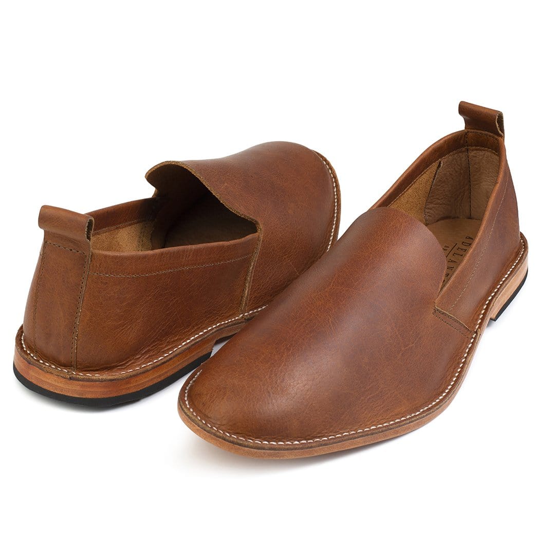 Men's 3E-wide light brown leather slip-ons, shown at an angle, also made for size 15.5 feet – The Viento