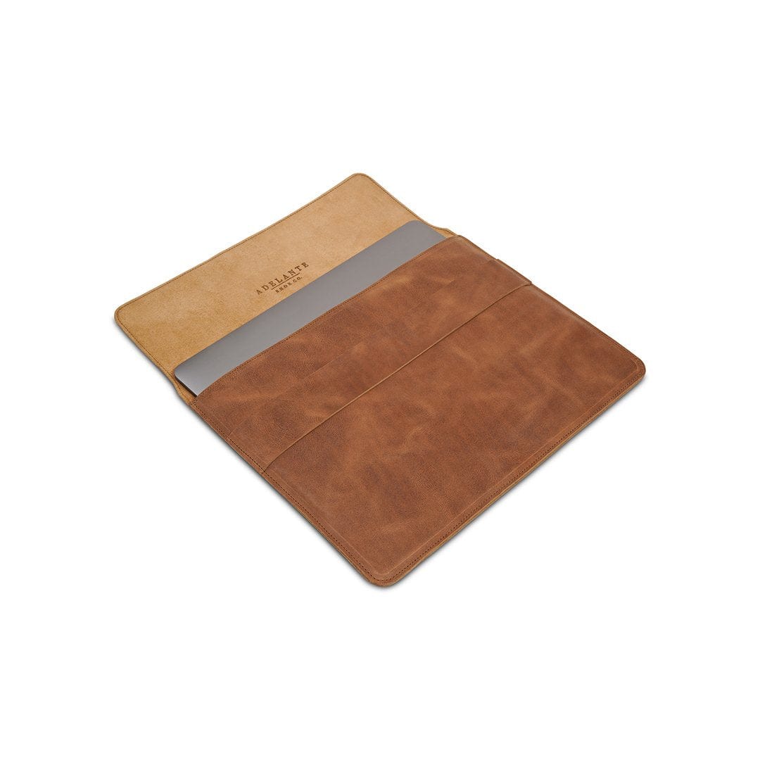 Tan leather laptop sleeve, shown open, made to order