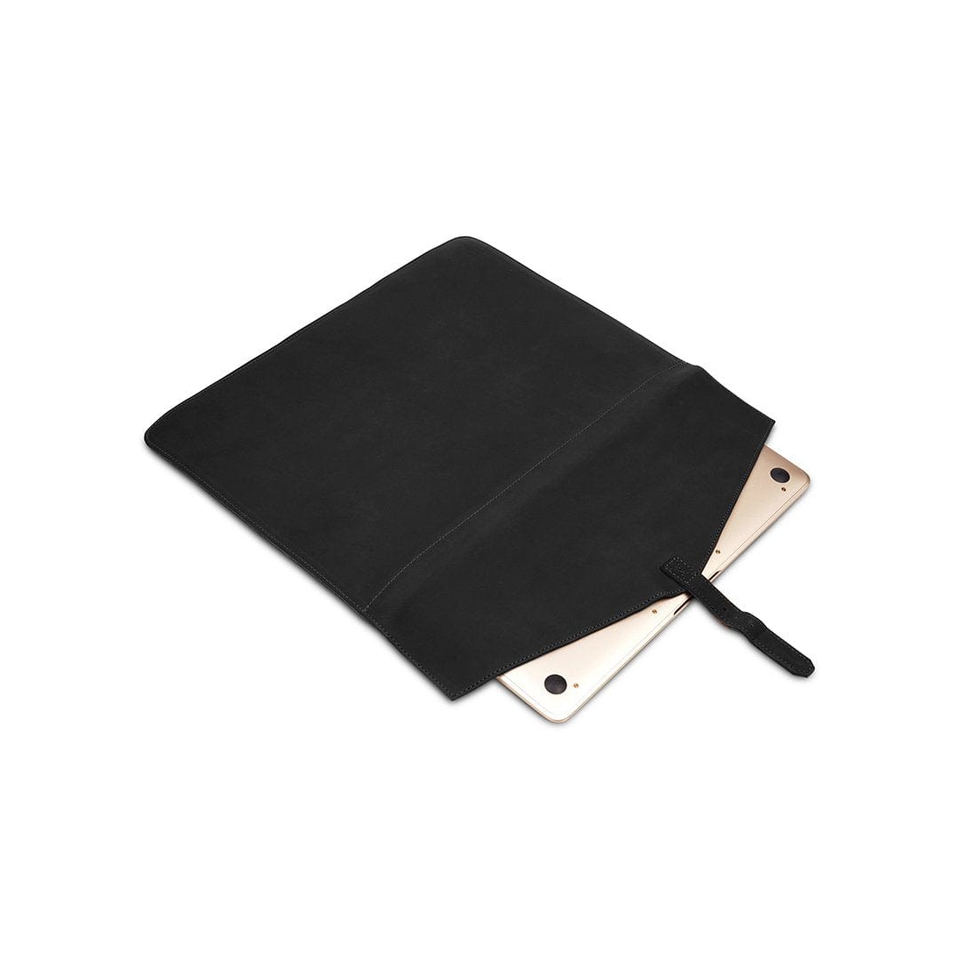 Black leather laptop sleeve with buckle strap, shown open, stitched by hand in Guatemala