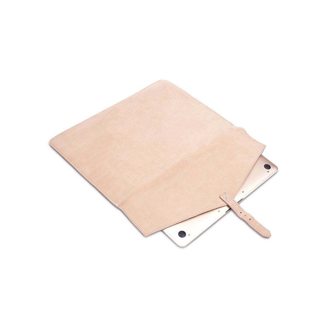 Cream leather laptop sleeve with buckle strap, shown open, handcrafted to order in Guatemala