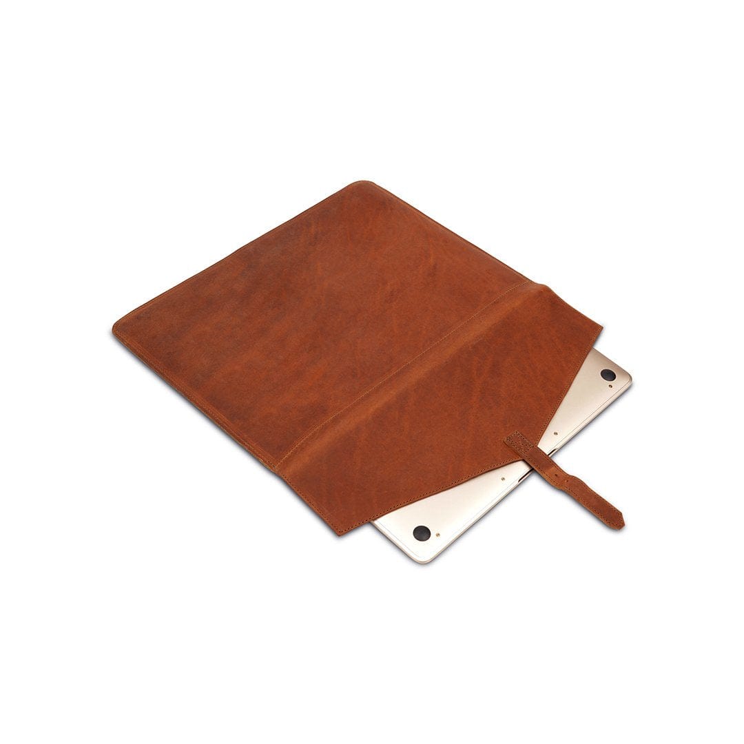 Light brown leather laptop sleeve with buckle strap, shown open, handcrafted and made to order