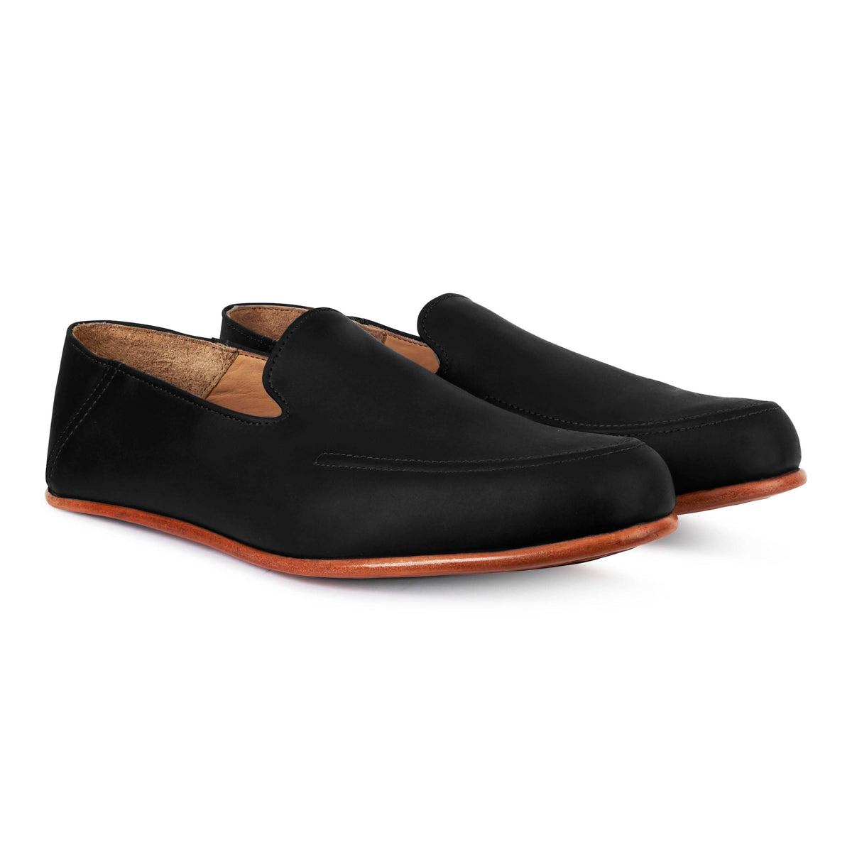 Men's 3E-wide black leather zero-drop loafers, shown from the front at an angle – The Tomás