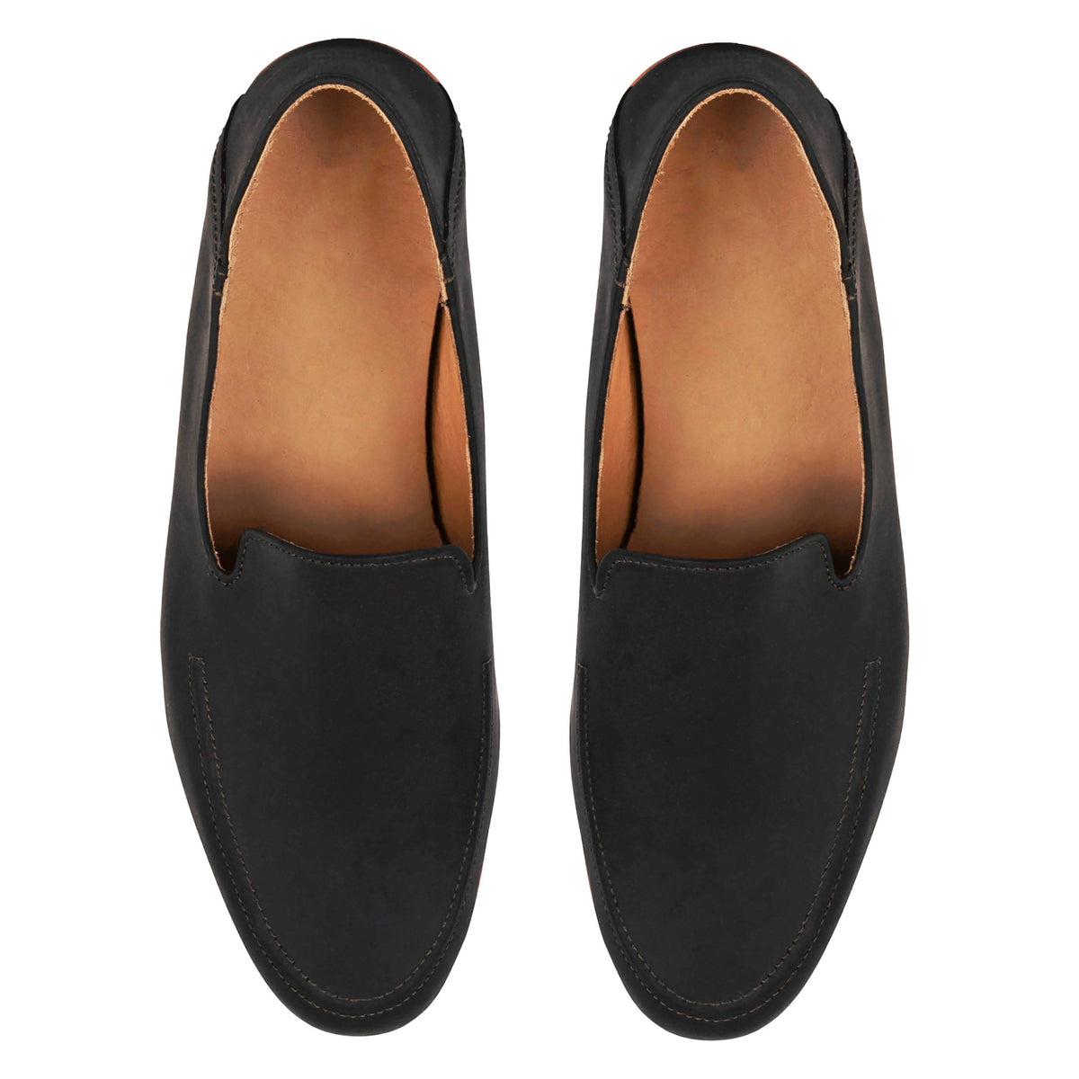 Top-down view of a pair of men's 4E-wide black leather zero-drop loafers – The Tomás