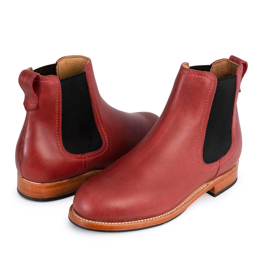 Red womens Chelsea boots with black elastic side panels pull tabs contrast stitching and low walking heels