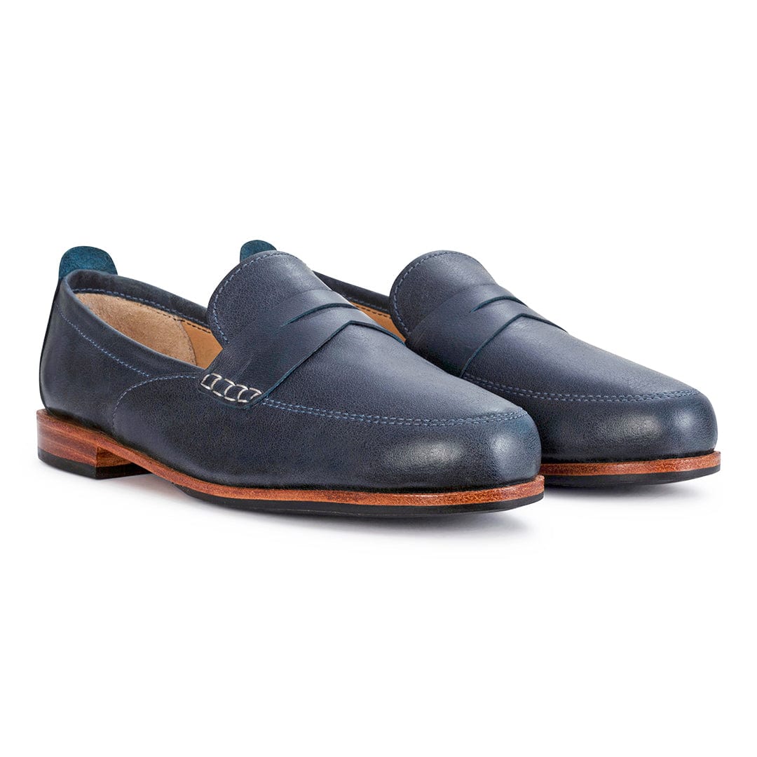 Women's EE wide blue leather dress loafers, shown at an angle – The Sabina