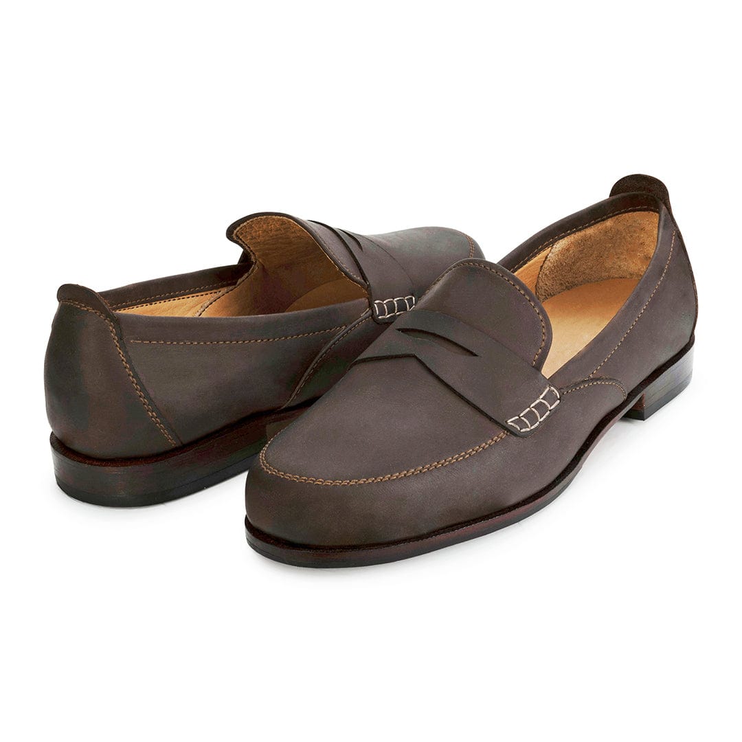 Pair of women's 3E-wide dark brown leather dress loafers, shown from the front at an angle – The Sabina