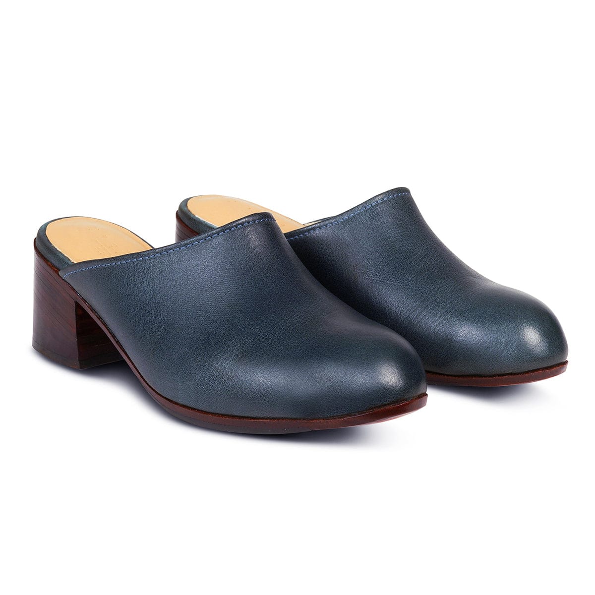 Women's narrow A-width blue leather heeled mules, shown from the front at an angle. Custom sizing on request – The Camila