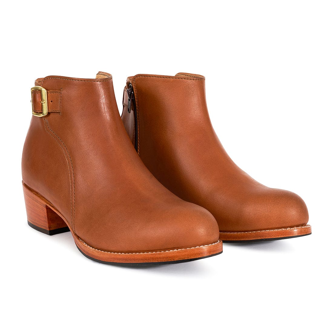 Brown women's buckle booties with block heels and side zippers by Adelante, available in wide widths