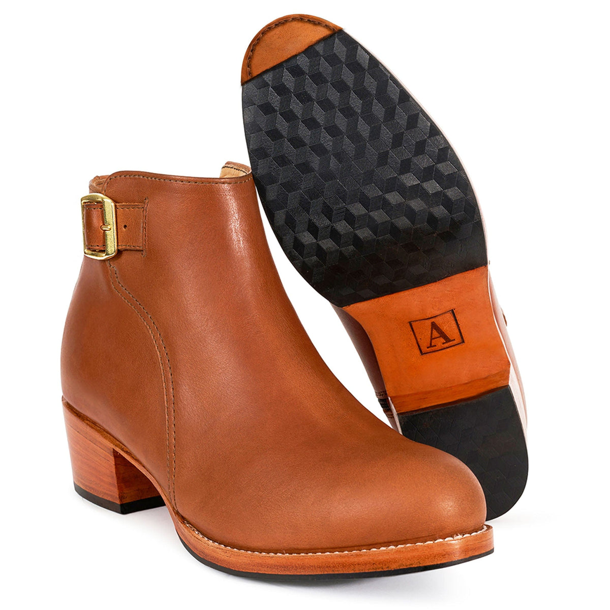 Cognac leather women's buckle booties with block heels and textured soles from Adelante Shoes