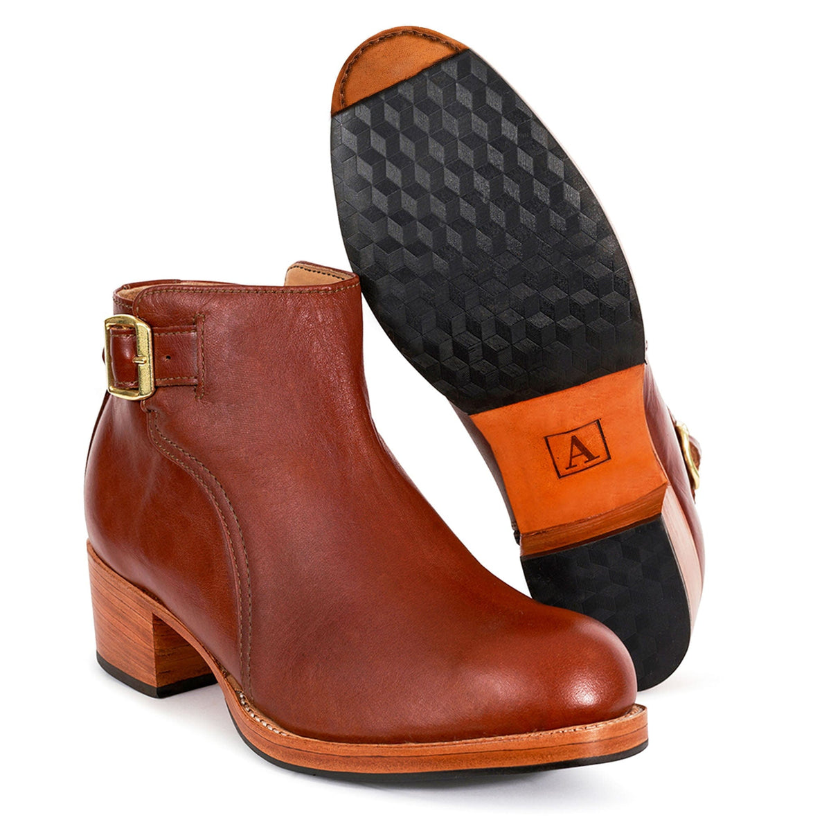 Adelante women's brown leather buckle bootie with block heel, side zipper, adjustable strap, and patterned sole, available in wide widths