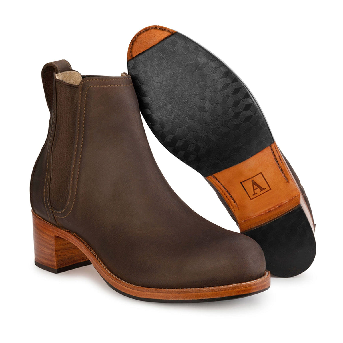 Women's 2E-wide dark brown leather heeled Chelsea boot, showing the leather sole, each pair made to order