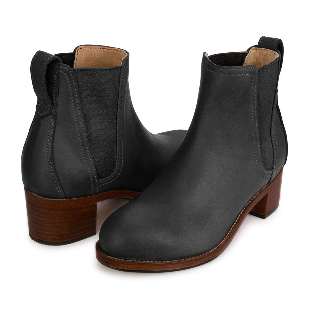 Women's EE wide black leather heeled Chelsea boots, shown from the front at an angle. Crafted for wide and narrow feet – The Catalina