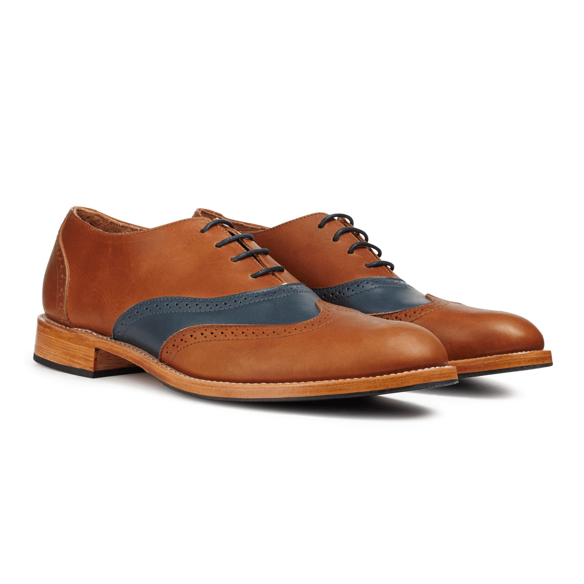 Pair of men's 3E-wide light brown and blue leather oxfords, shown from the front at an angle, made to order for hard-to-fit feet