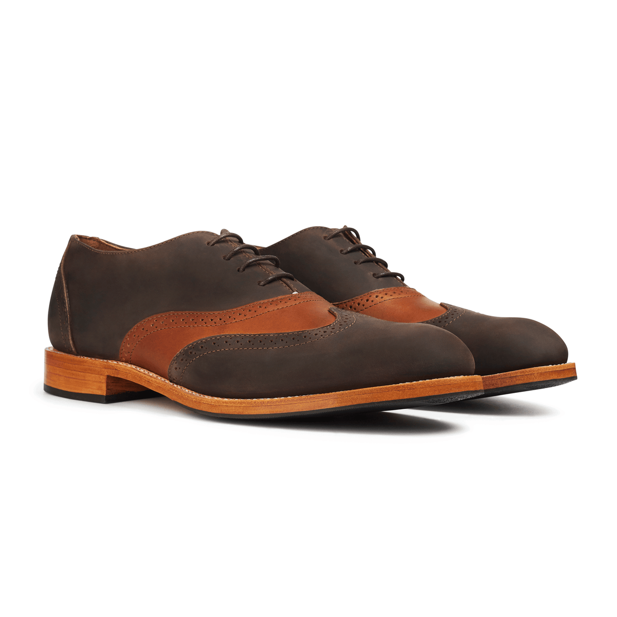 Men's 3E-wide light brown and dark brown leather oxfords, shown at an angle, available to order in size 4 – The Clásico