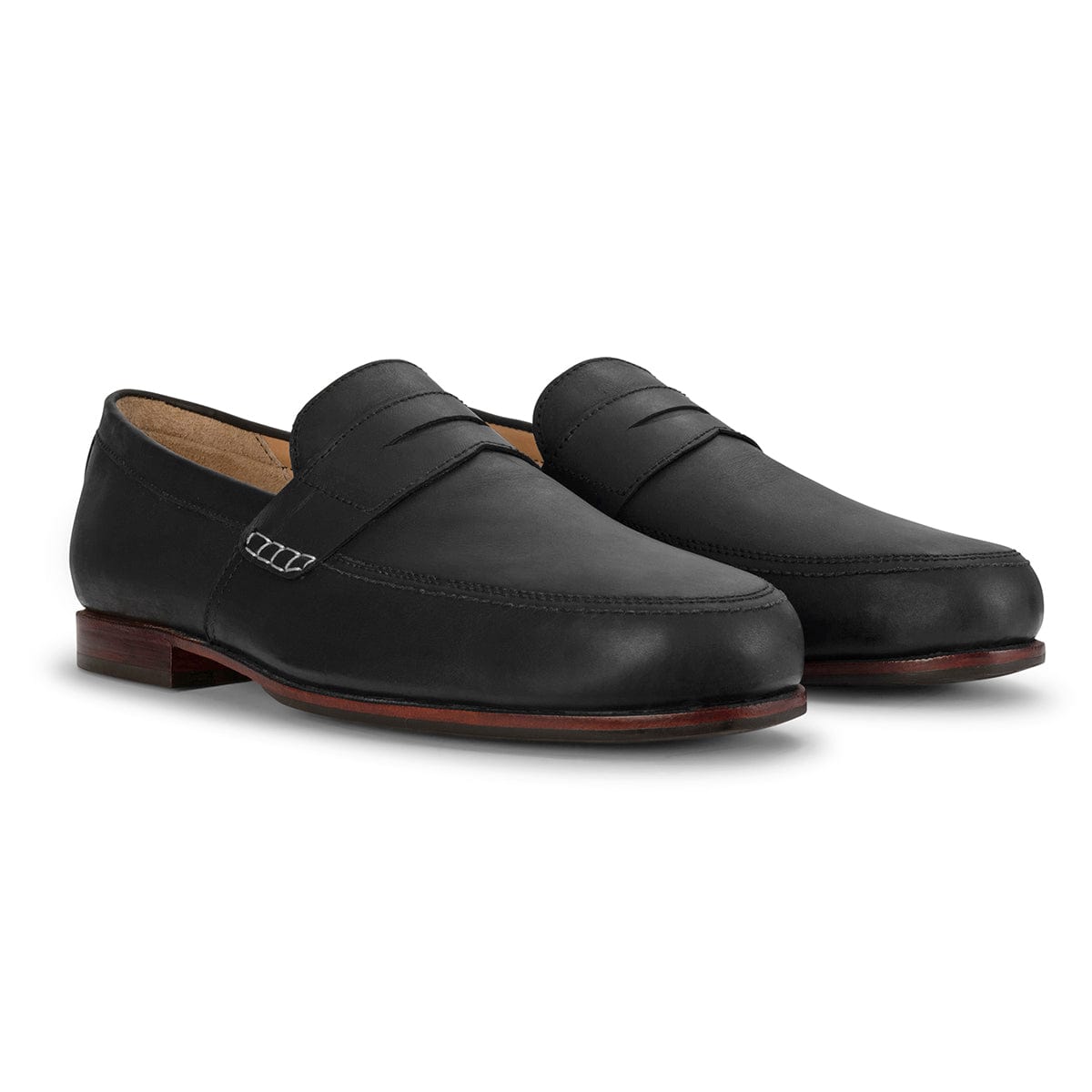 Adelante Lorenzo men's black leather dress loafers with sleek apron toes, penny straps, and red accented soles handcrafted in Guatemala