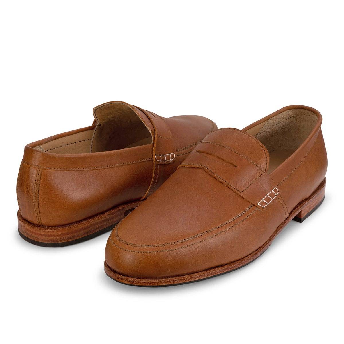 Brown full-grain leather men's dress loafers by Adelante, handcrafted with moc toe stitching and a classic slip-on style.