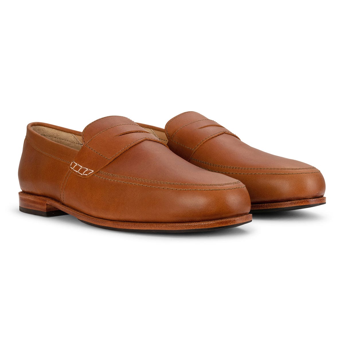 Adelante handcrafted brown leather men's loafers with sleek apron toe and classic slip on design, available in wide widths