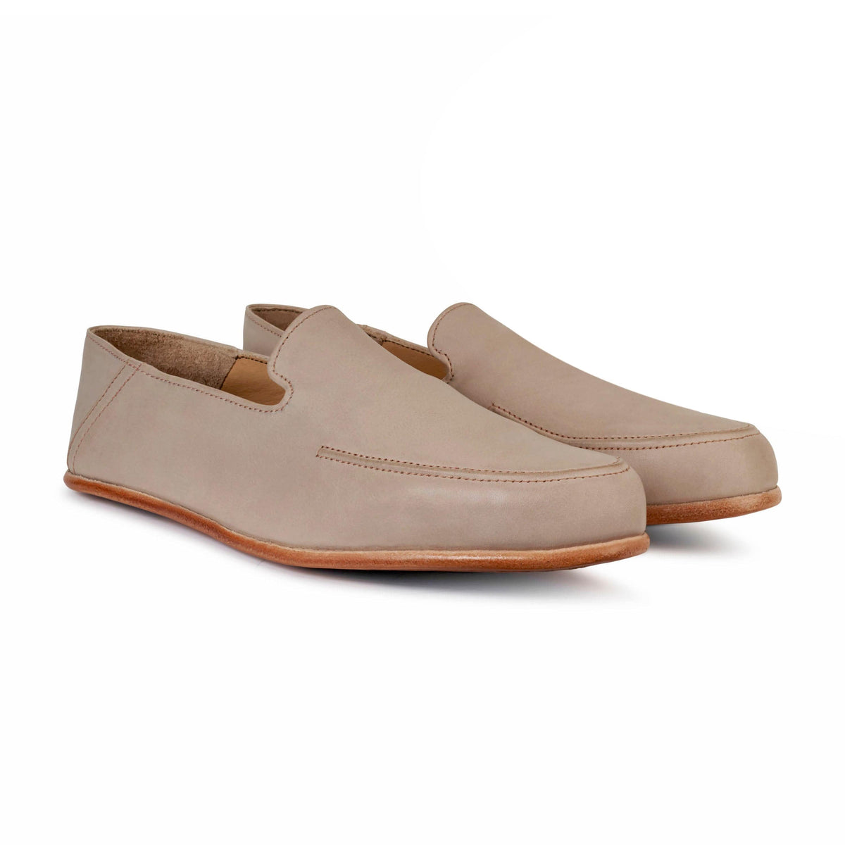Men's 2E-wide cream leather zero-drop loafers, shown from the front at an angle. Available in every half size – The Tomás