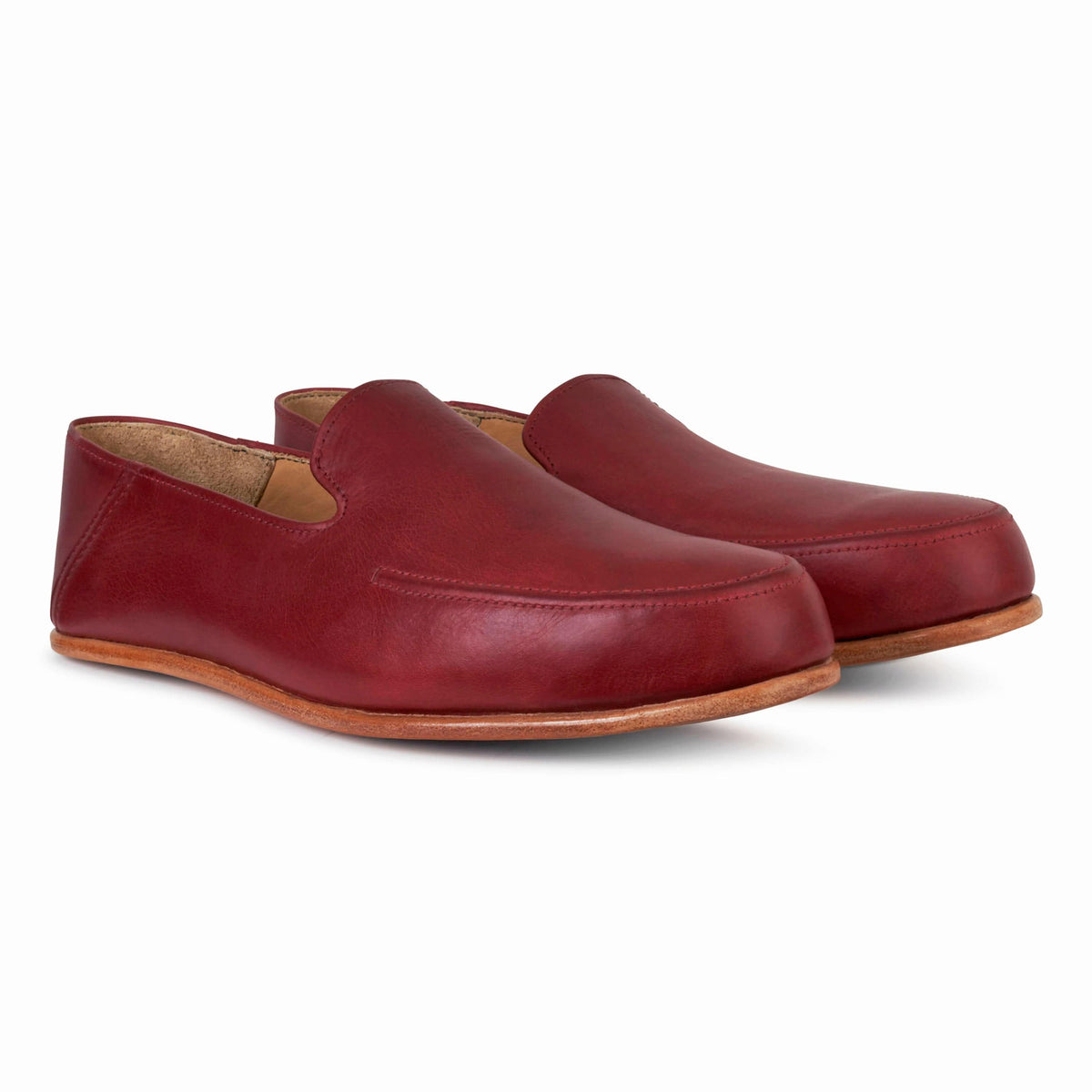 Men's extra-wide red leather zero-drop loafers, shown at an angle, made to order in size 16.5 – The Tomás