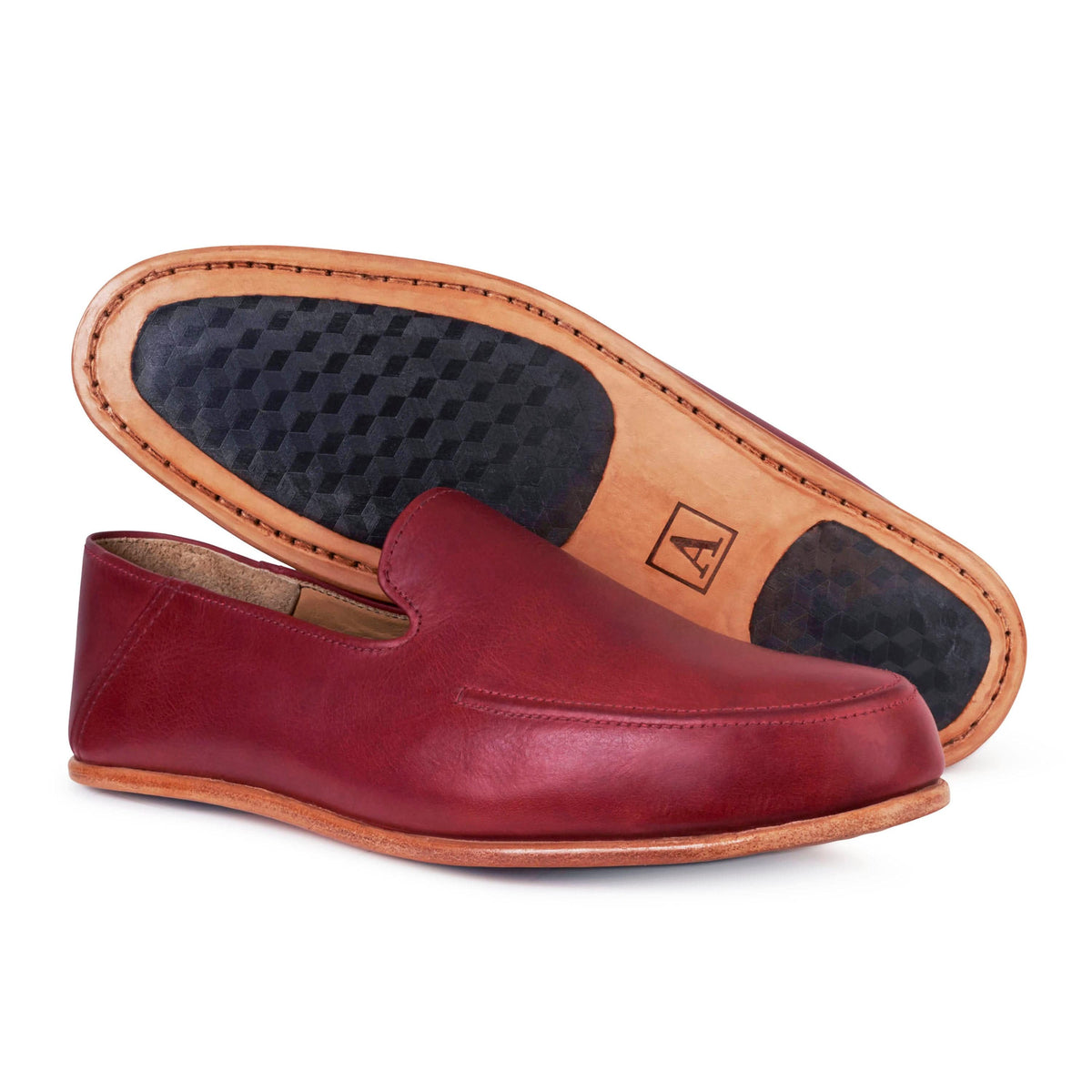 Men's EEEEE extra-wide red leather zero-drop loafers, shown with the sole turned up, handcrafted to fit size 14 – The Tomás