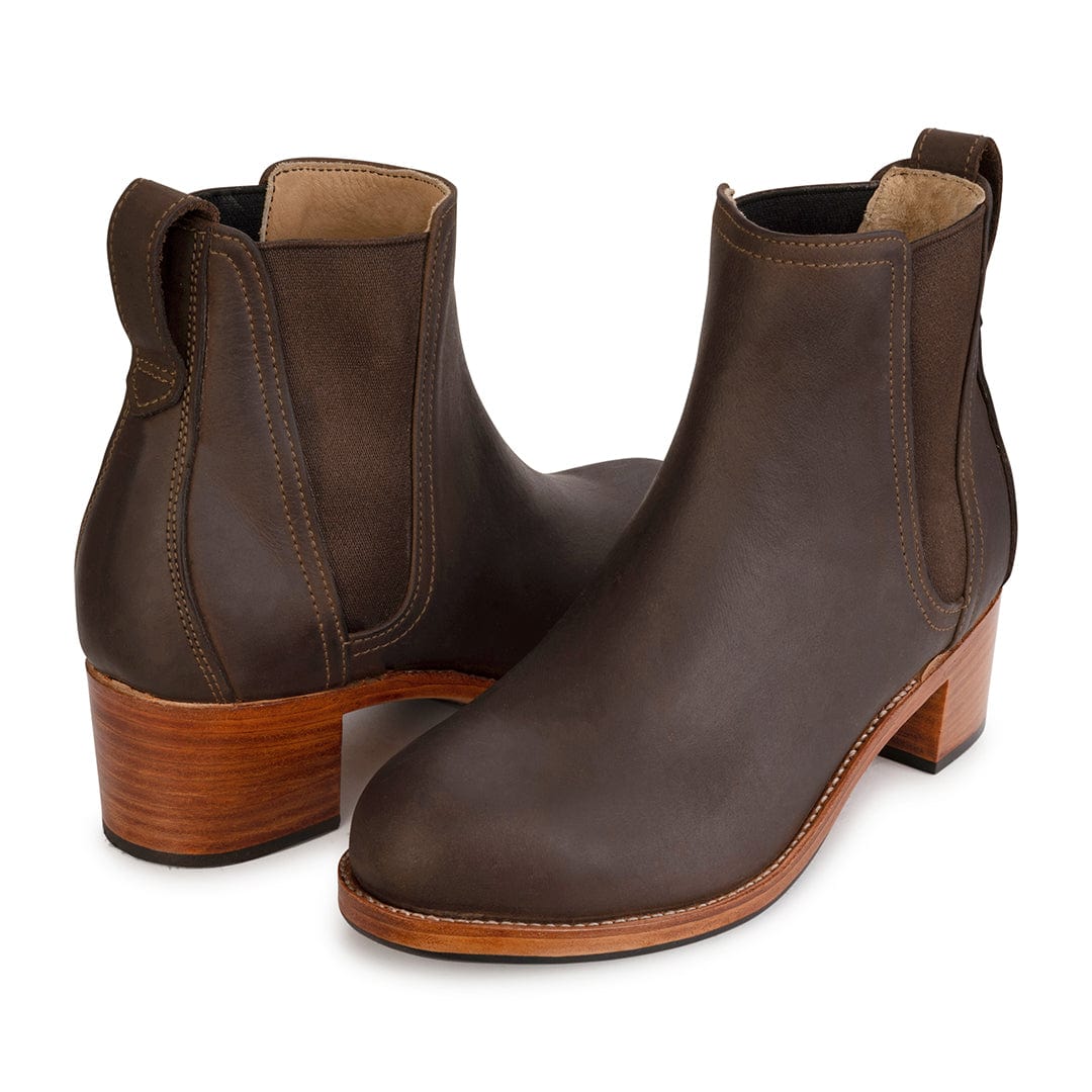 Women's EE wide dark brown leather heeled Chelsea boots, shown at an angle, handcrafted to fit size 15