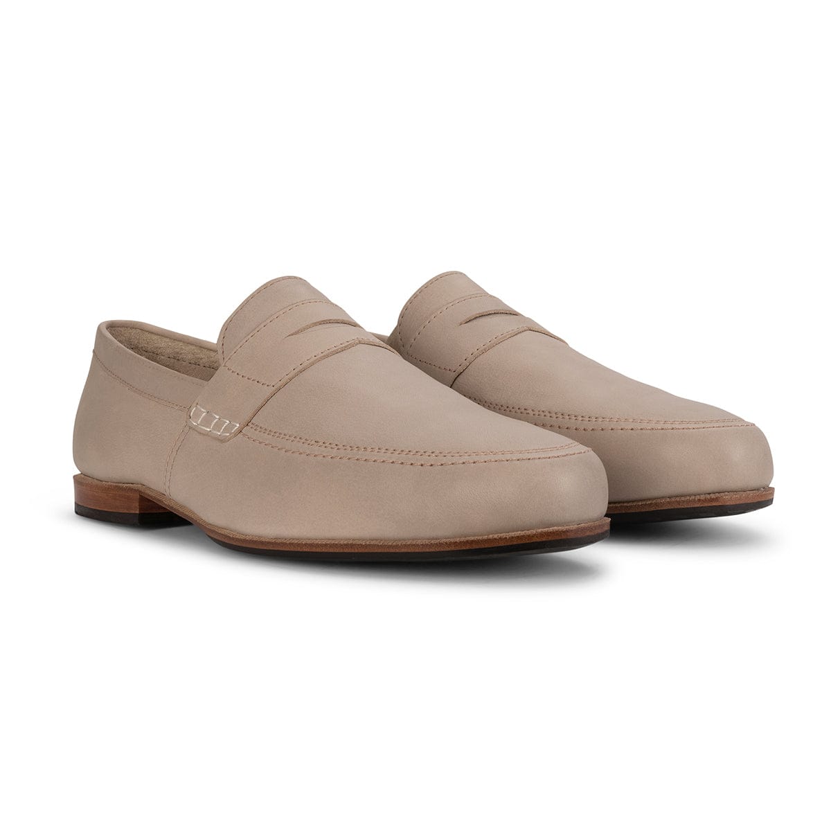 Taupe men's leather loafers with apron toe, penny strap detail, Blake stitched construction, and low stacked heels by Adelante Shoes