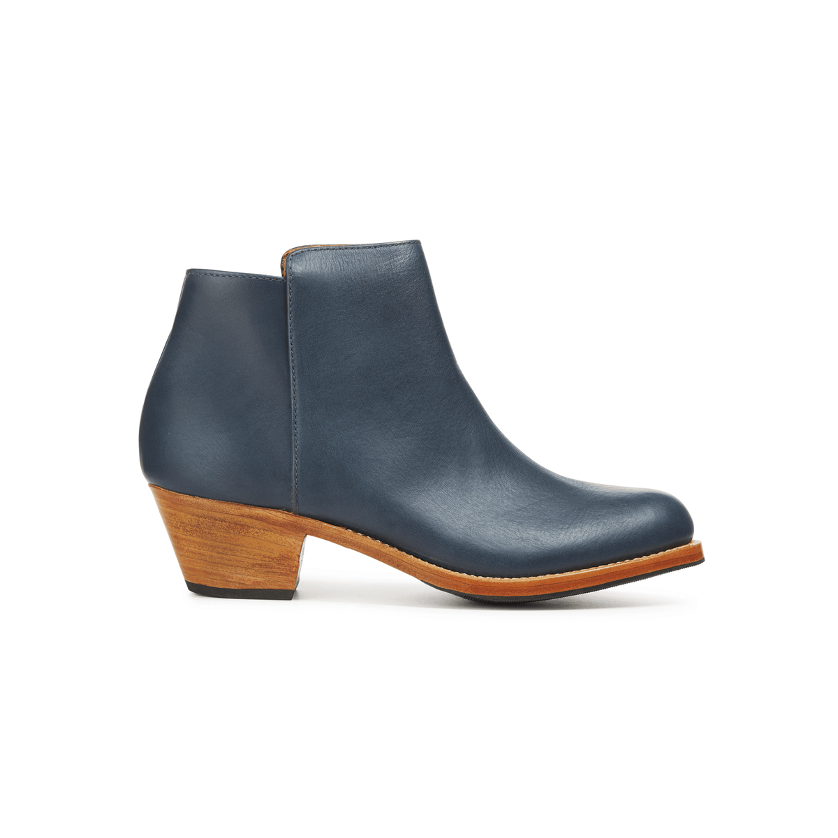 Dark navy leather womens ankle bootie with a tapered wood heel by Adelante, available in narrow to extra wide widths