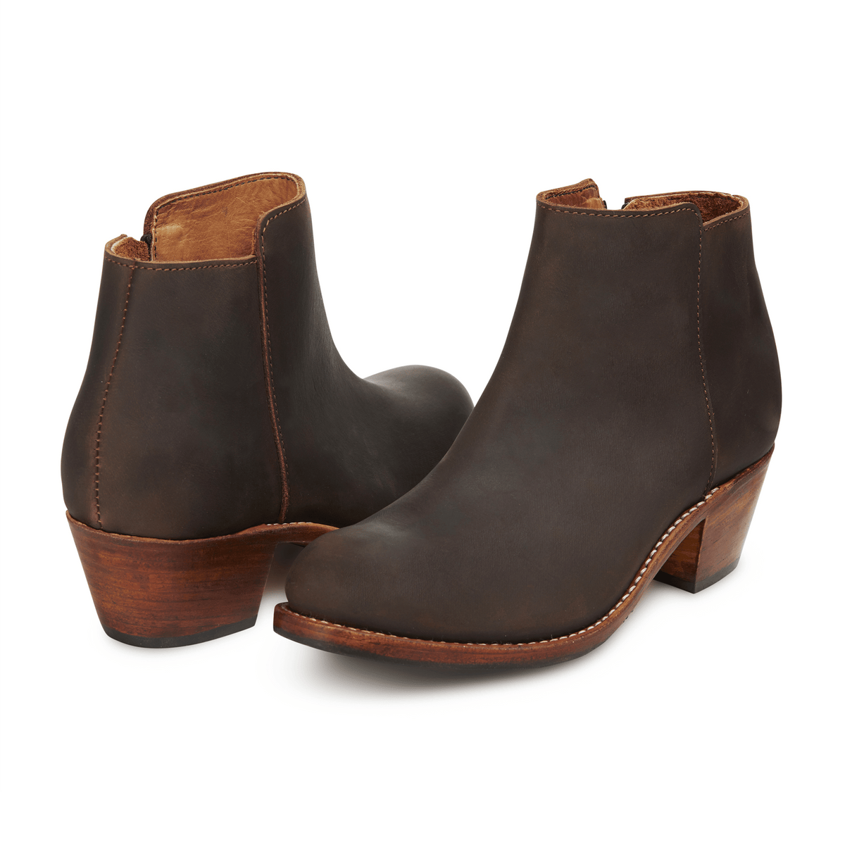 Brown leather womens ankle boots with tapered wooden heels and stitched welt detail available in narrow to extra wide widths