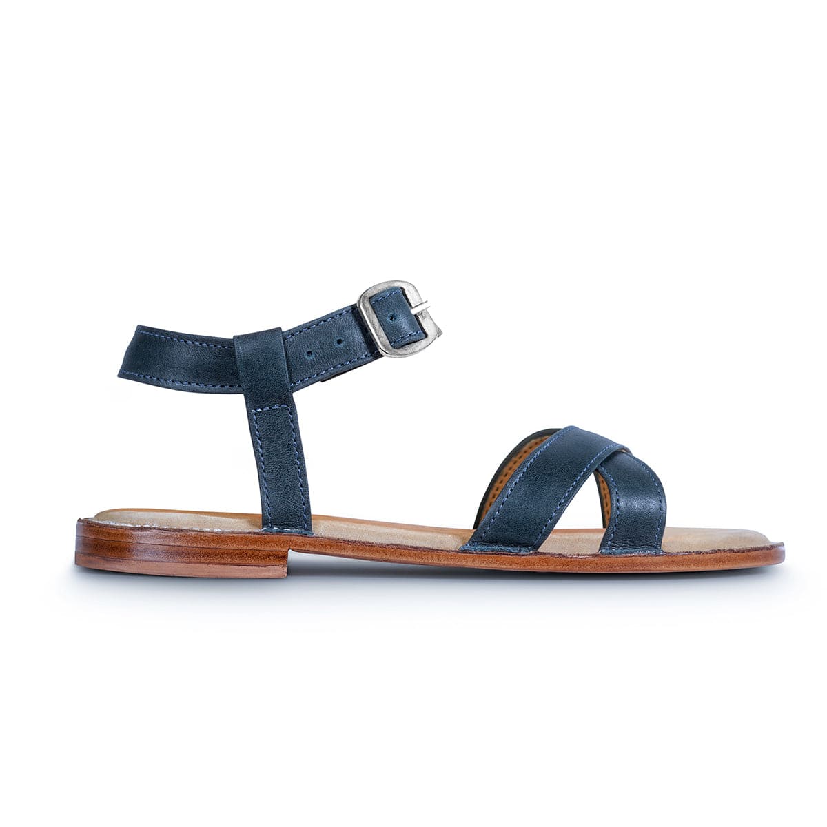 Navy blue leather women's sandal with adjustable ankle strap and buckle detail handcrafted by Adelante Shoes