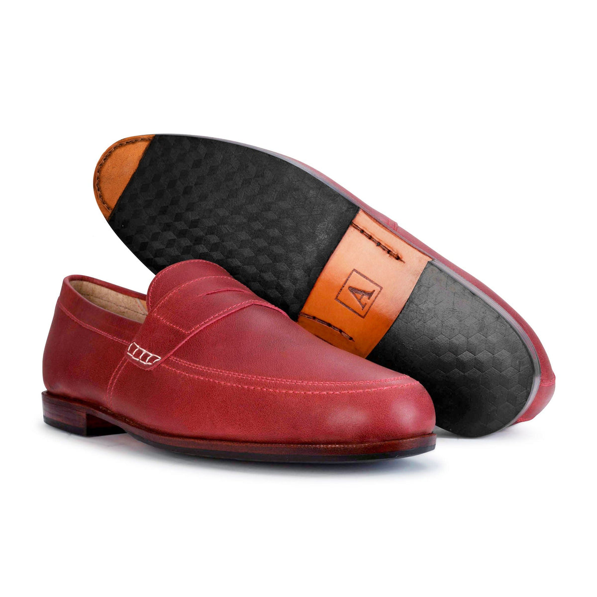 Red leather mens dress loafers with sleek slip on styling and textured rubber soles by Adelante Shoes available in wide widths