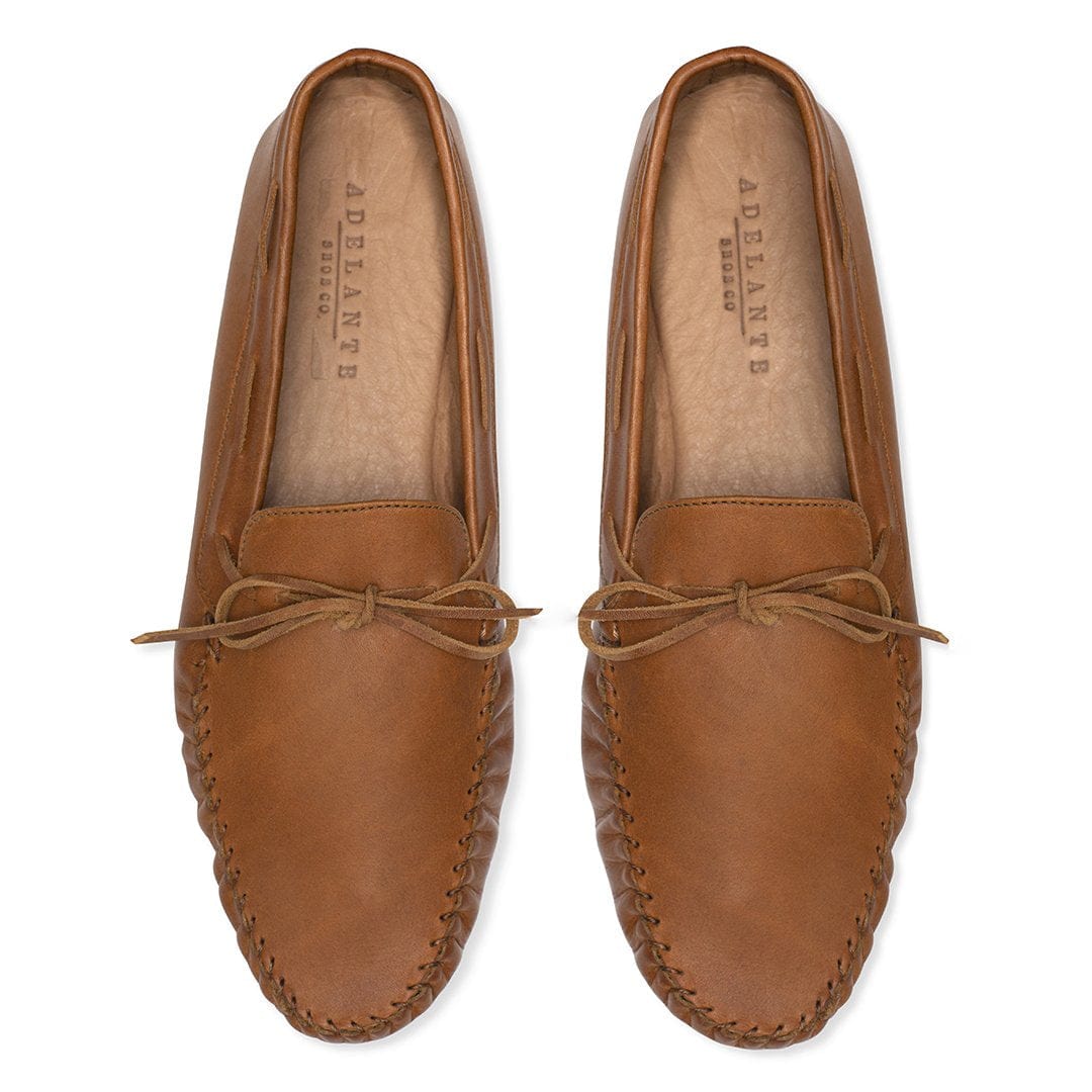 Men's 2E-wide light brown leather moccasins, seen from above. Crafted for wide and narrow feet