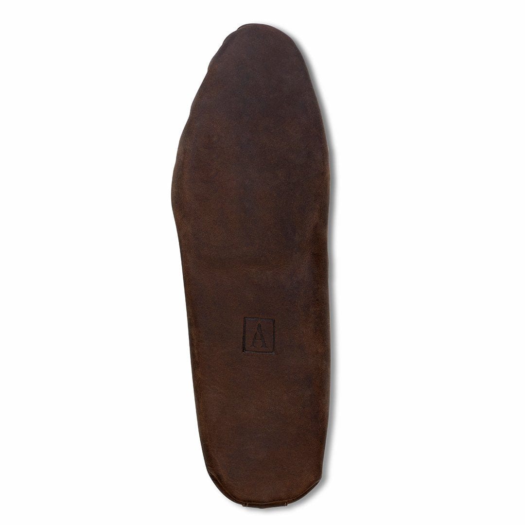 Men's 4E-wide dark brown leather moccasin, showing the leather sole, each pair made to order