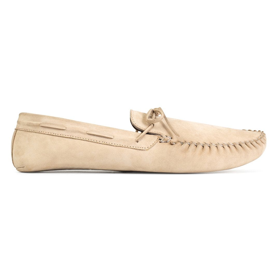 Side view of a men's 5E extra-wide cream leather moccasin, made to order in size 15