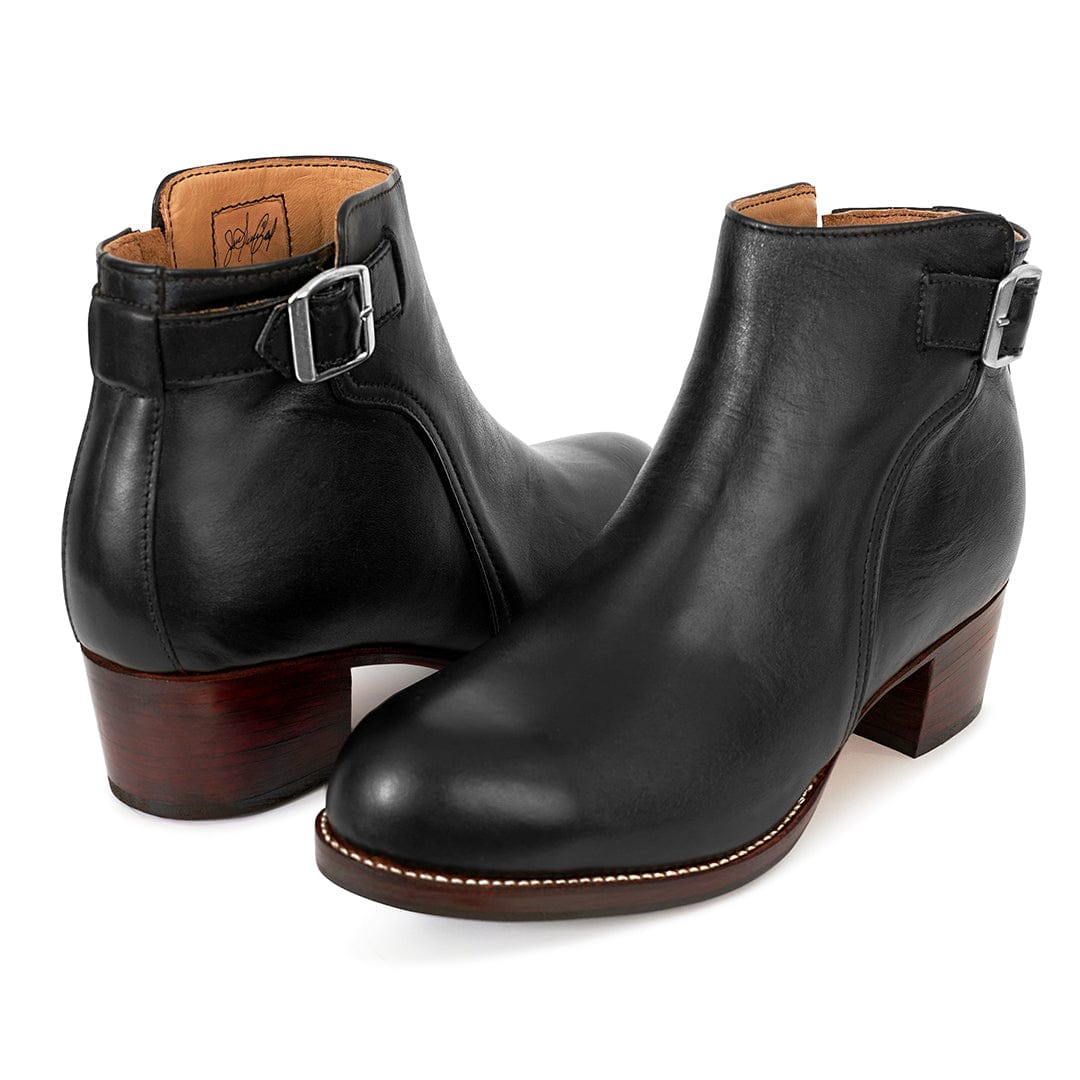 Black womens buckle booties with adjustable ankle straps, side zippers, rounded toes, and low block heels in narrow to extra wide widths