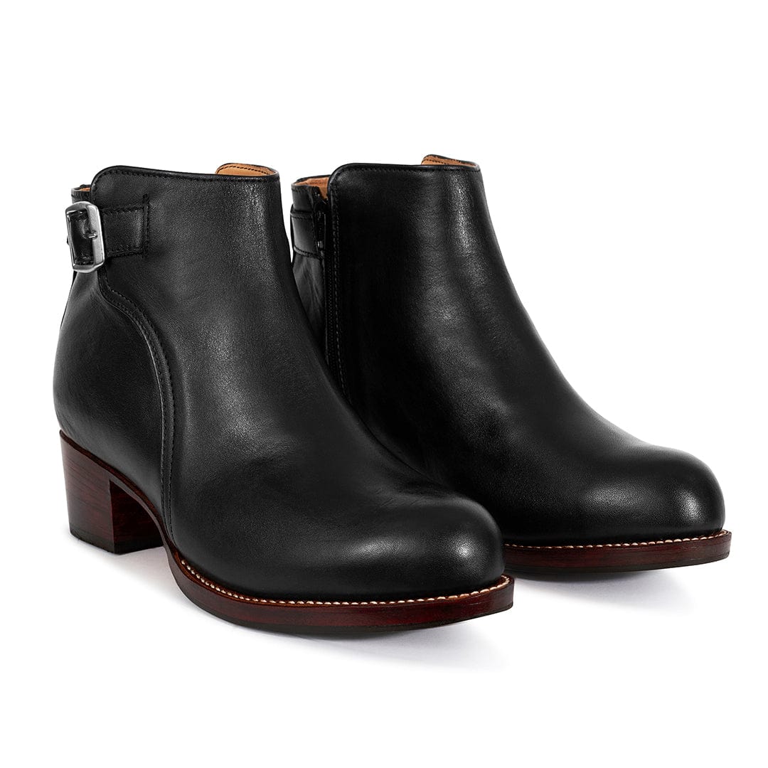 Black leather women's buckle booties with block heels and side zippers, available in narrow to extra wide widths from Adelante Made-To-Order