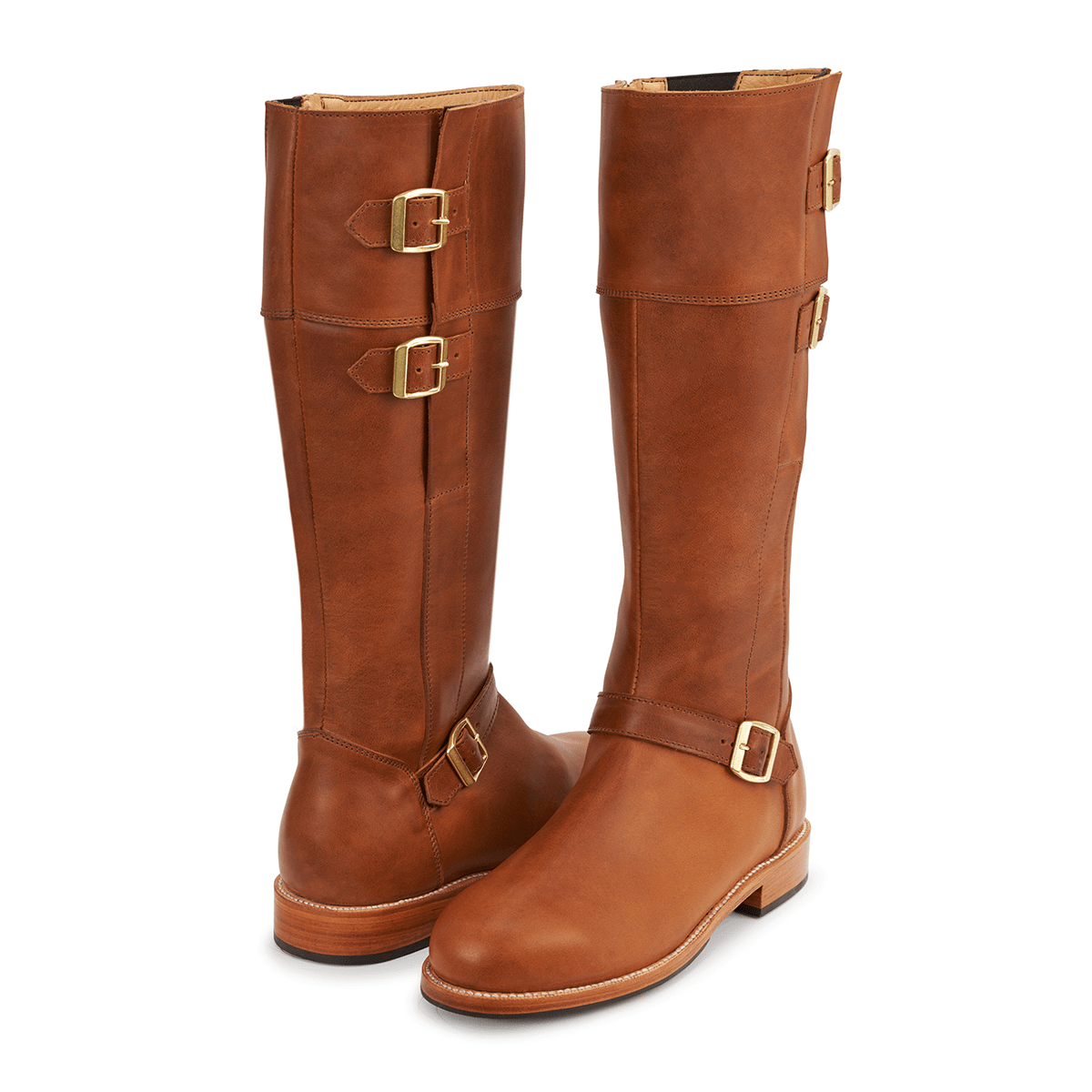 Adelante women's brown leather knee high riding boots with brass buckles, wraparound detailing, and custom calf widths