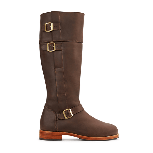 Side view of a women's 2E-wide dark brown leather equestrian boot, calf width made to fit – The Reina