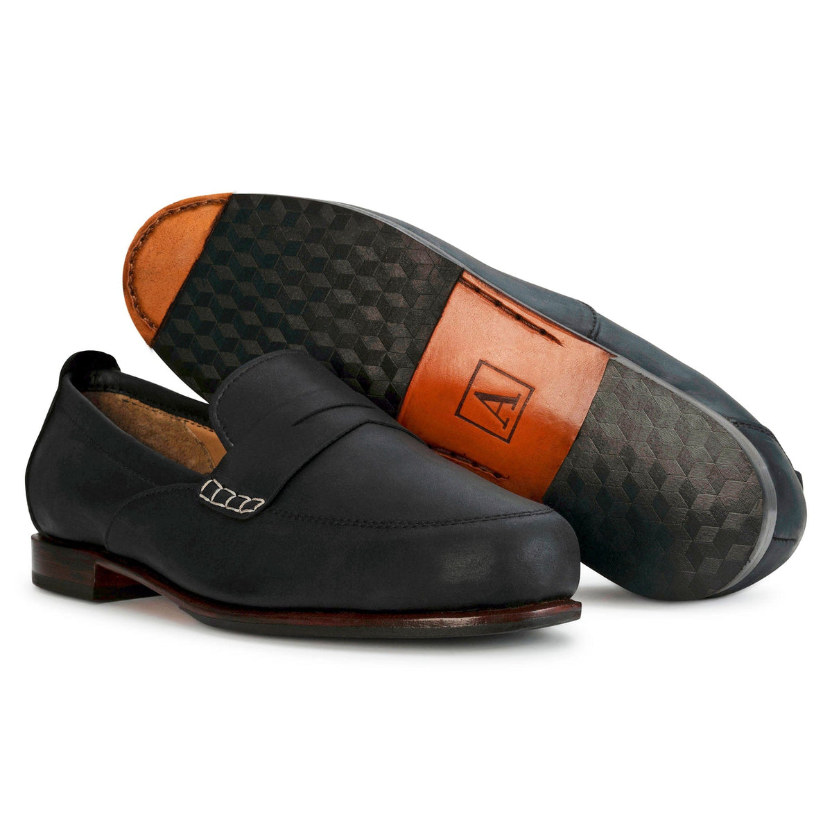 Women's EEE wide black leather dress loafers, shown with the sole turned up, can be made in size 14 – The Sabina
