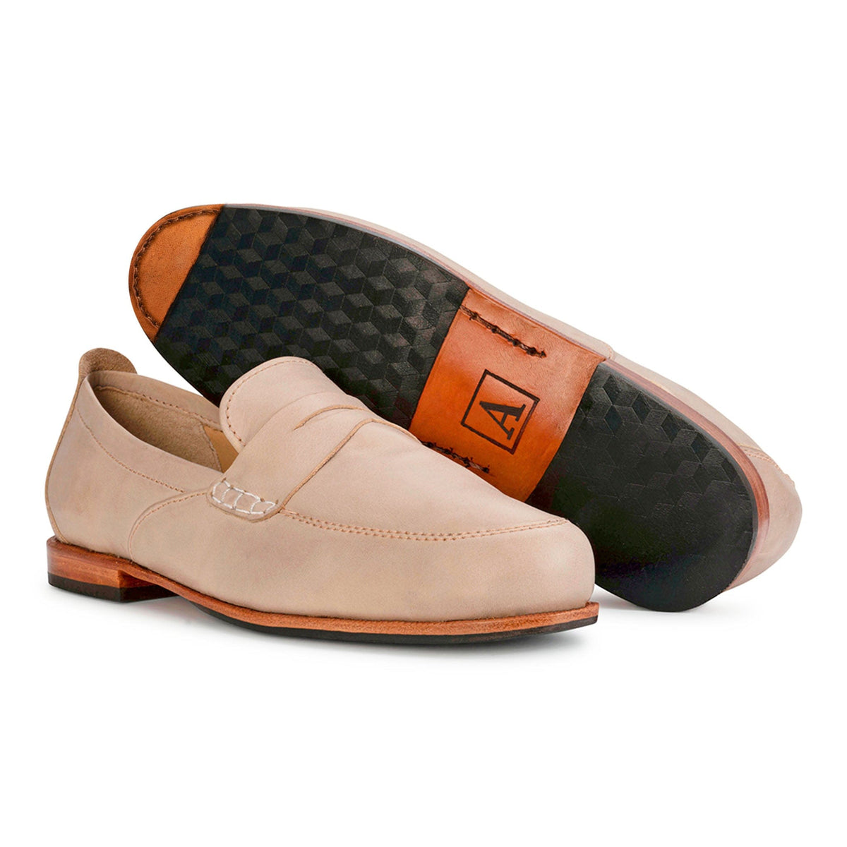 Women's EEE wide cream leather dress loafers, shown with the sole turned up, also made for size 12 feet – The Sabina