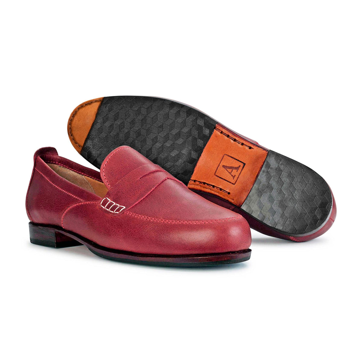 Women's narrow A-width red leather dress loafers, shown with the sole turned up – The Sabina