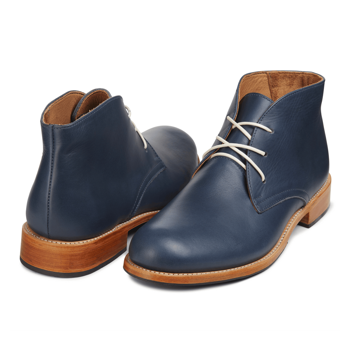 Men's 2E-wide blue leather chukka boots, shown at an angle, available to order in size 4.5 – The Santiago