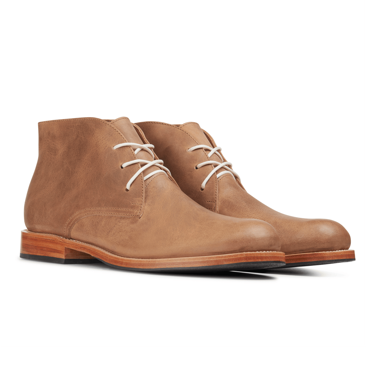 Men's 2E-wide tan leather chukka boots, shown from the front at an angle – The Santiago
