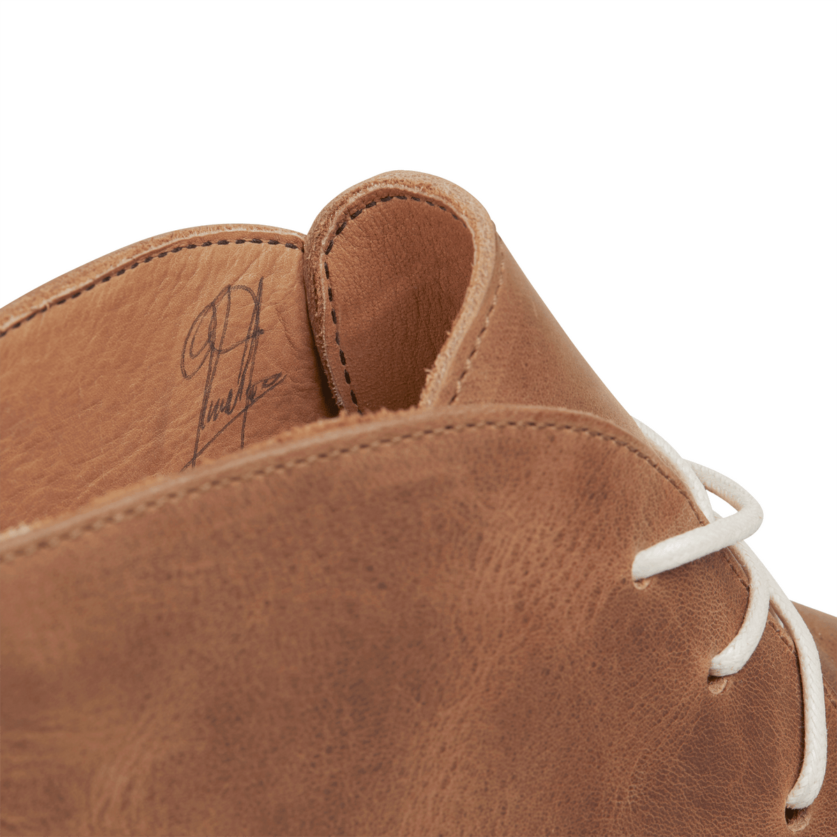 Close-up of the tan leather on the men's chukka boot – The Santiago