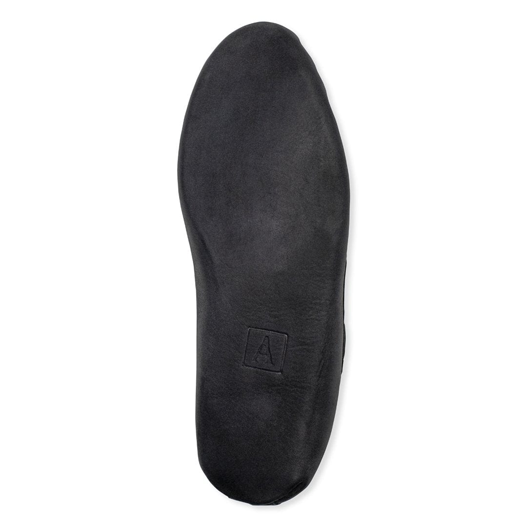 Black leather moccasin sole with subtle Adelante logo, handcrafted for women in narrow to extra wide widths