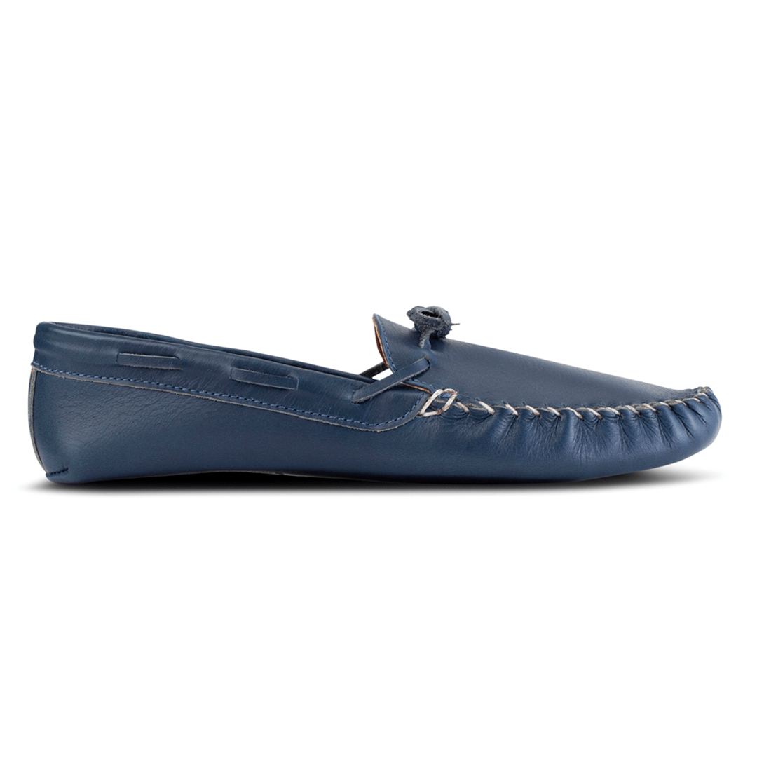 Navy blue women's leather moccasin with gathered toe and hand-laced detail, handcrafted for comfortable indoor wear