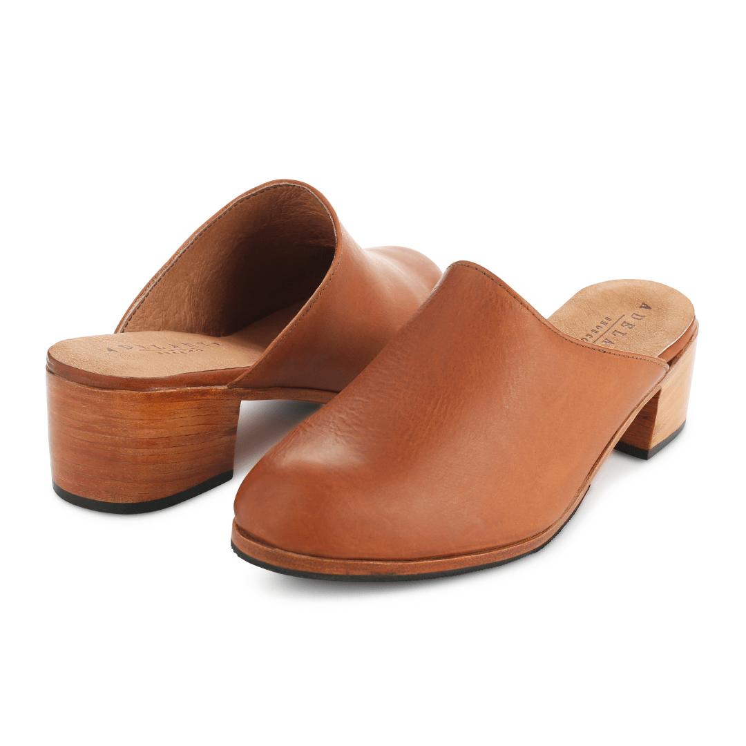 Women's 2E-wide light brown leather heeled mules, shown at an angle, a size 15 is no problem – The Camila