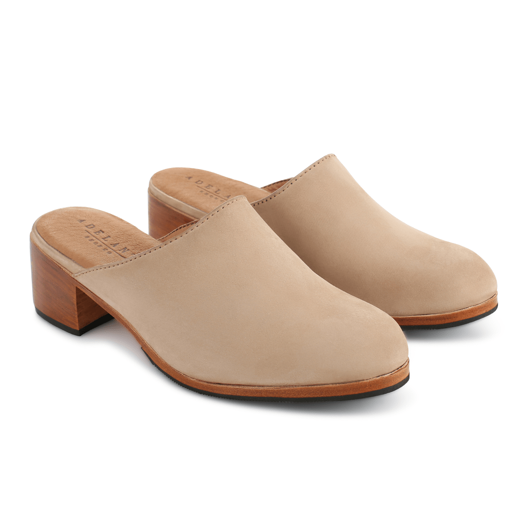 Women's 3E-wide cream leather heeled mules, shown at an angle, available to order in size 12 – The Camila