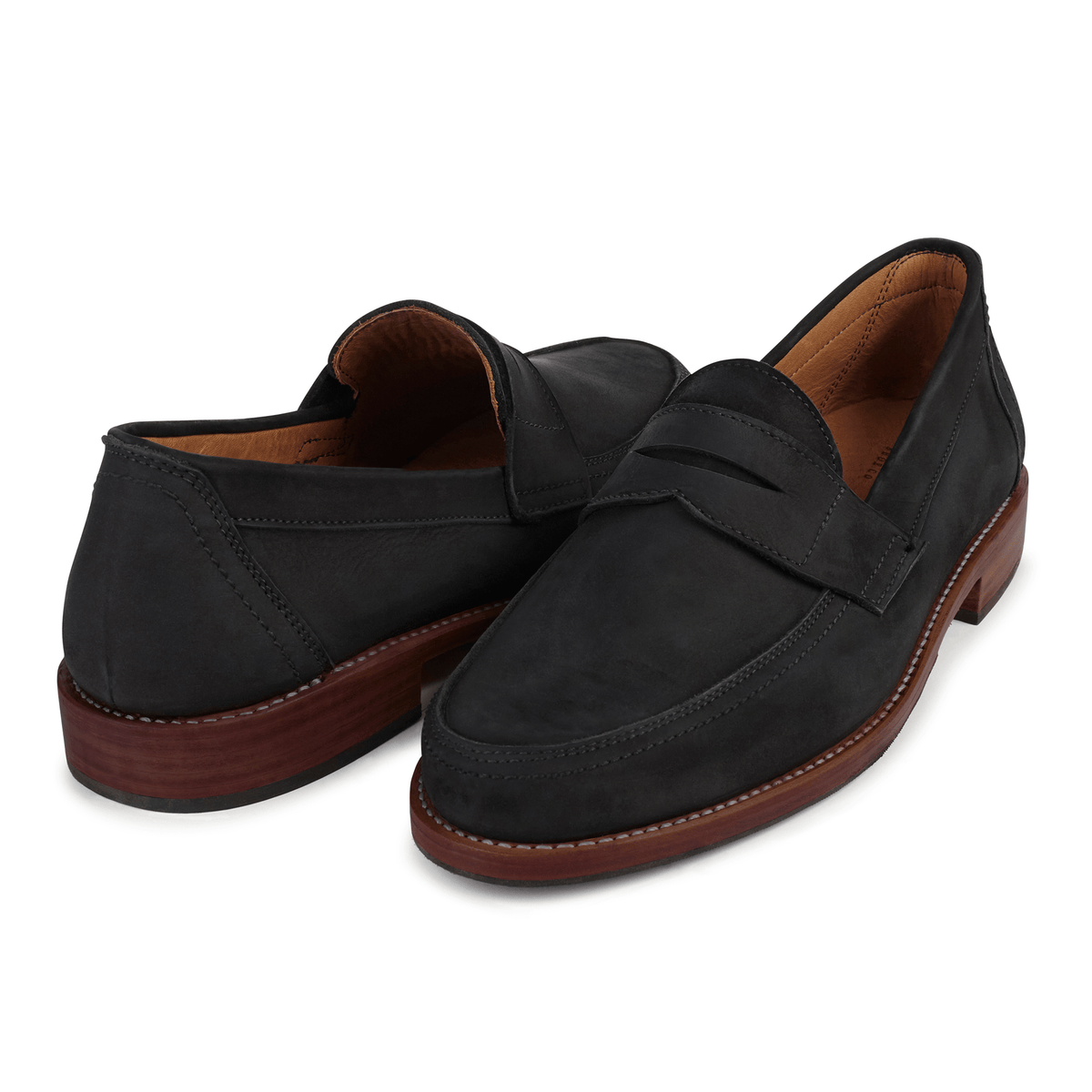 Black mens penny loafers with classic penny straps, stitched detailing, brown stacked soles, and tan interiors