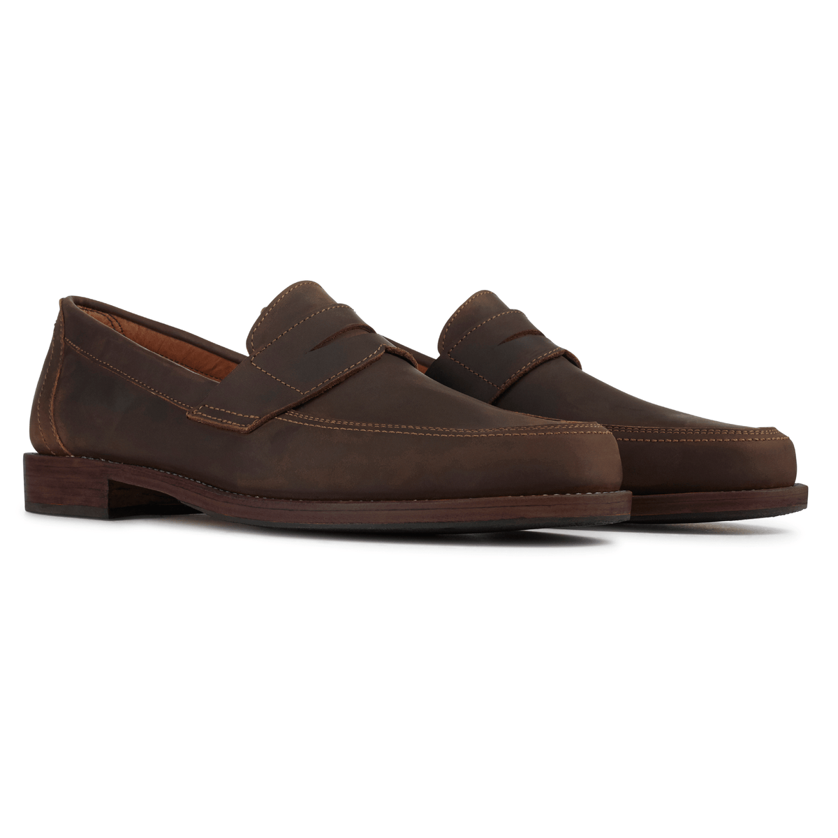 Brown men's penny loafers with classic penny bridge, sleek toe, and low stacked heel by Adelante Made-To-Order